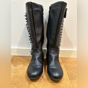 Girls black leather calf boots.
